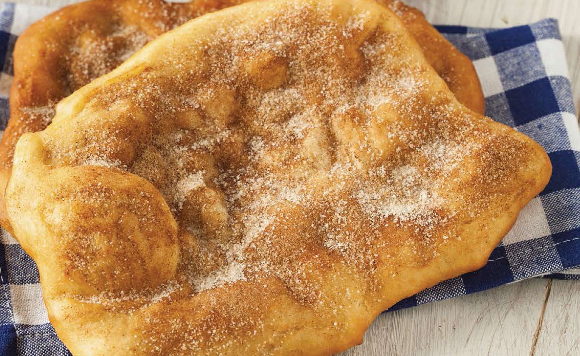 Fried dough dusted with sugar